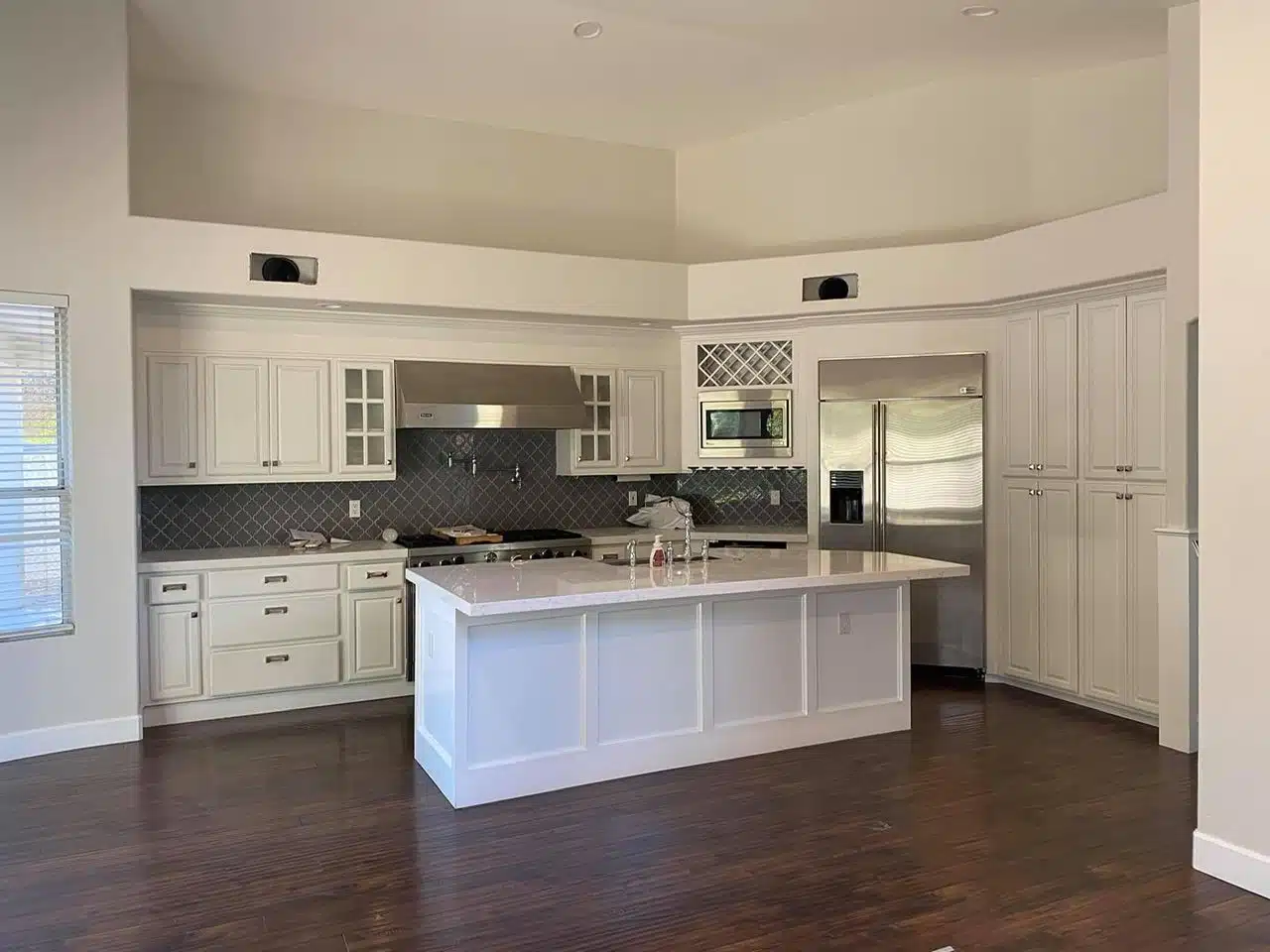 Painted kitchen cabinets and walls in Tucson home for a modern upgrade.