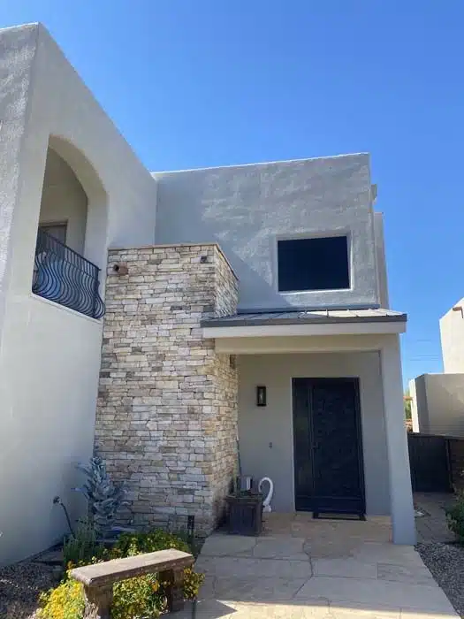 Fresh Stucco Repaint – Tucson Home Fresh exterior stucco painting on a Tucson home with smooth, even coverage. The new paint protects against sun damage and boosts curb appeal.